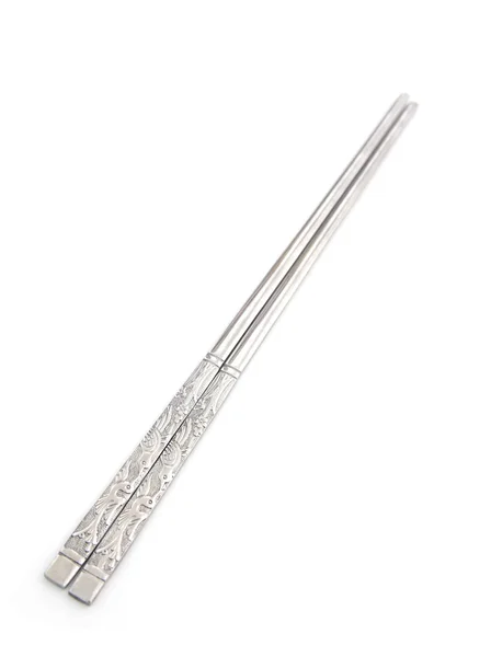 Metal chopsticks isolated on white — Stock Photo, Image
