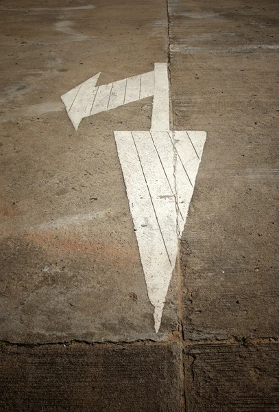 White arrow marking on road — Stock Photo, Image