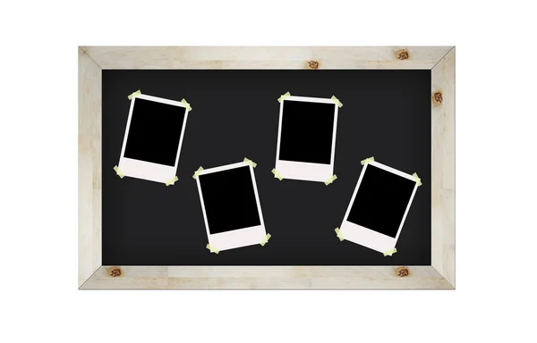 Molduras de fotos em branco no quadro negro isolado no branco — Fotografia de Stock