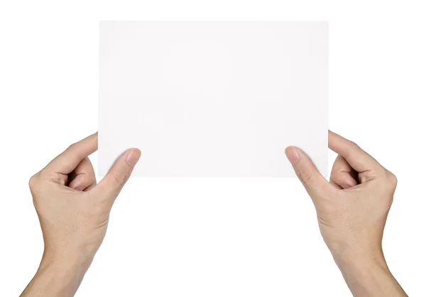 Empresario mano sosteniendo en blanco tarjeta de visita de papel aislado sobre fondo blanco —  Fotos de Stock
