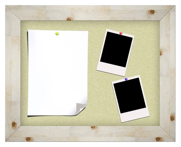 Blank instant photos and notes on cork board — Stock Photo, Image