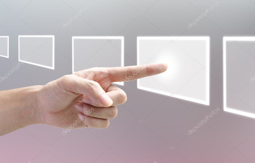 Hand pushing a button on a touch screen interface