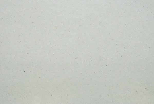 Textura de papelão reciclado cinza ou fundo — Fotografia de Stock
