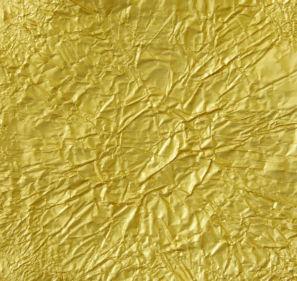 Gold metallic crumpled paper texture for background — Stock Photo, Image