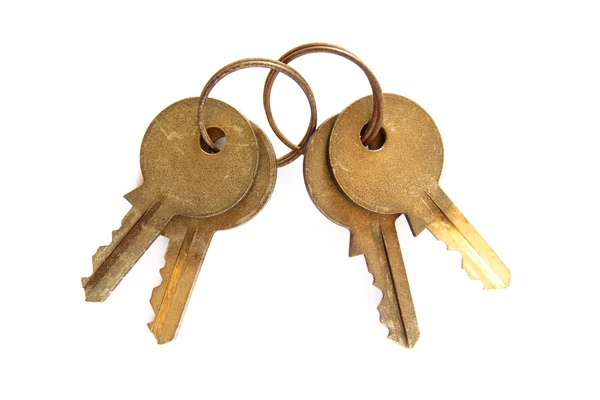 Bündel alter Schlüssel isoliert auf weißem Grund — Stockfoto