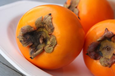 Persimmon fruit or kaki clipart