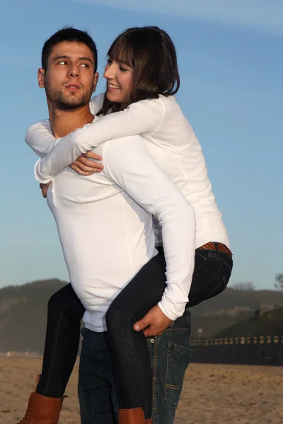 Hugging and smiling lovers — Stock Photo, Image