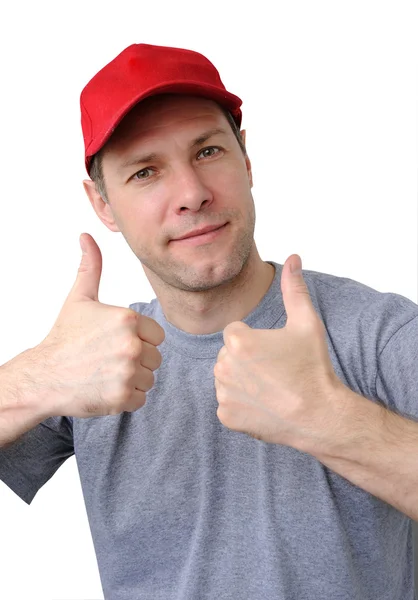 Feeling good working man in a red cap — Stock Photo, Image