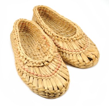 Isolated natural bast shoes clipart