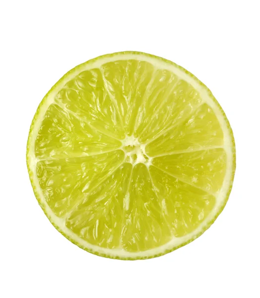 Isolierte Früchte auf weißem Grund, eine Scheibe Limette — Stockfoto