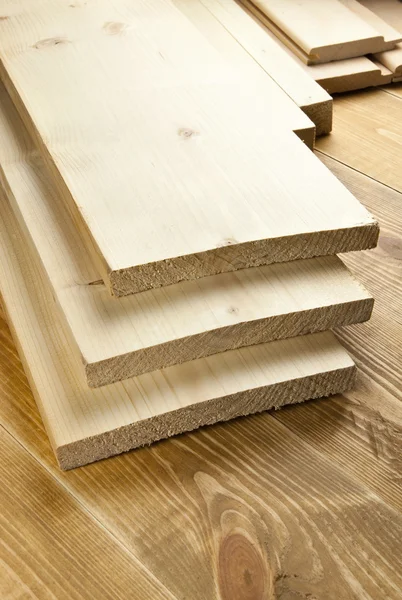 Tábuas de madeira na placa de madeira — Fotografia de Stock