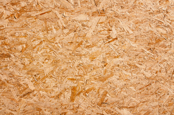 Recycled compressed wood chippings board