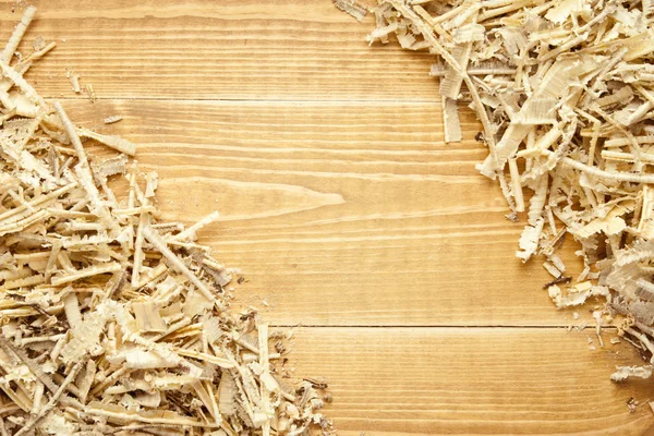 Wooden sawdust and shavings background with space for text — Stock Photo, Image