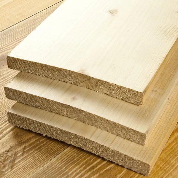 Wood planks on wooden board — Stock Photo, Image