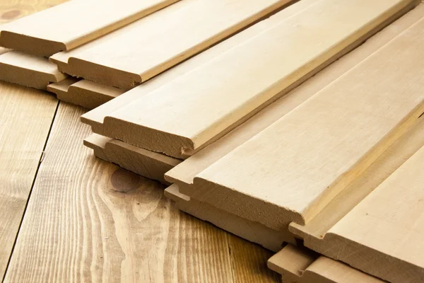 Tábuas de madeira na placa de madeira — Fotografia de Stock