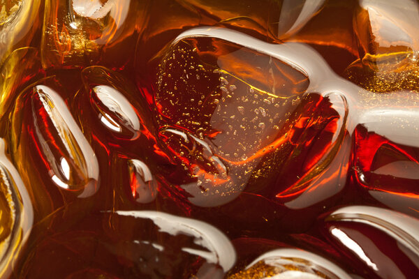 Cola drink with ice cube