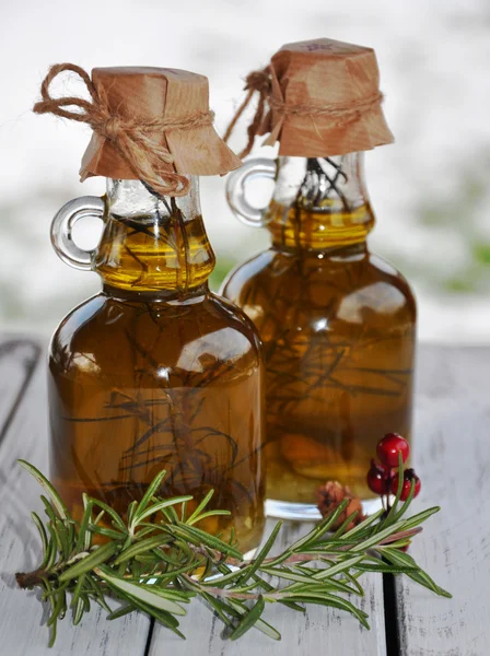 Olio di oliva con rosmarino Immagini Stock Royalty Free