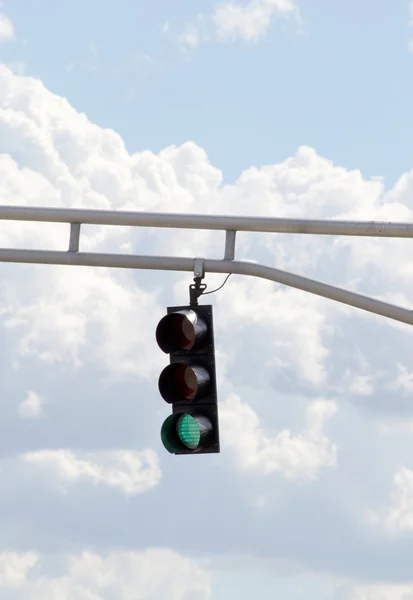 stock image Black Traffic Signal Displaying a Green Light