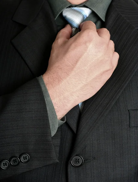 Csípés a nyakkendőjét üzletember — Stock Fotó