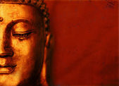 Buddha tvář s červeným pozadím