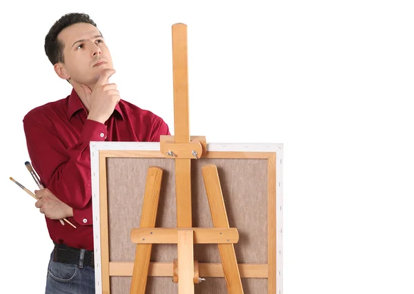 Artista pintor pelo cavalete isolado — Fotografia de Stock