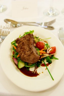 Beef steak with salad clipart