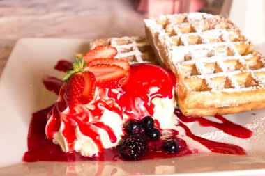 Belgian waffle with strawberry ice cream clipart