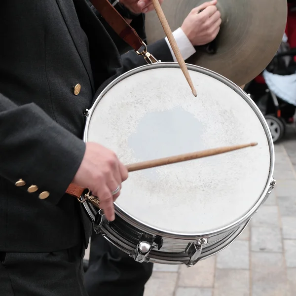 stock image By tapping the drum