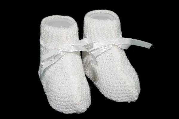 stock image Baby socks with black background ties