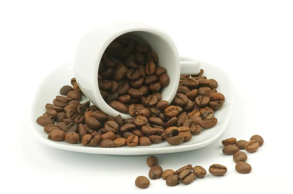 Kahve kupa kahve çekirdekleri ile — Stok fotoğraf