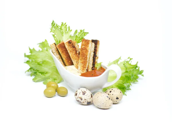 Snack from crackling bread with cheese sauce and a BBQ ketchup, leaves of s — Stock Photo, Image