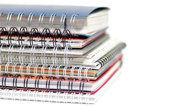 Multi colored Spiral notepads on white background background — Stock Photo, Image