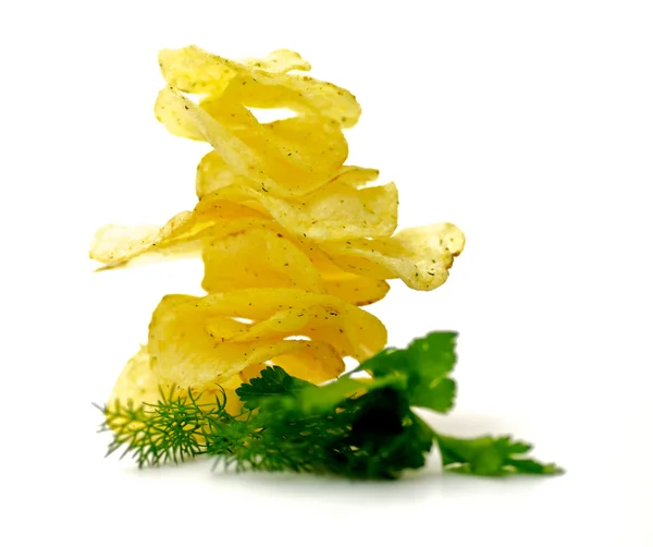 Potato Chips pyramid with dill and parsley isolated on white background — Stock Photo, Image