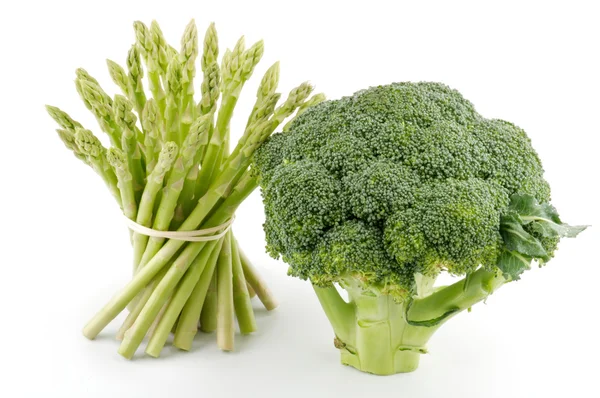 Asparagus sprouts and broccoli floret — Stock Photo, Image