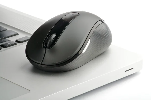 Laptop and computer mouse — Stock Photo, Image