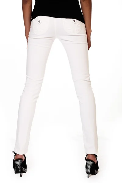 Pantalones vaqueros de moda blanca de chica americana femenina agaísta fondo blanco —  Fotos de Stock
