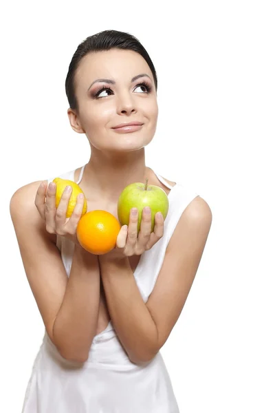 Beautiful happy smiling girl with fruits lemon and green apple — Stock Photo, Image