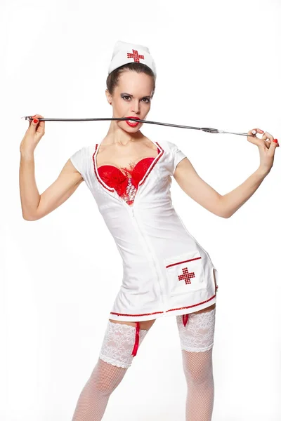 stock image Sexy beautiful female brunette doctor with stethoscope red lingerie white s