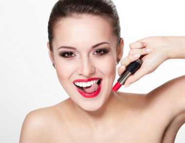 Closeup portrait of sexy smiling caucasian young woman model with glamour red lips,bright makeup, eye arrow makeup, purity complexion with red lipstick. Perfect clean skin.white teeth clipart