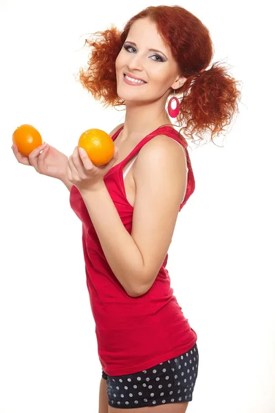 Portrait of beautiful smiling redhead ginger woman in red cloth isolated on white with orange — Stock Photo, Image