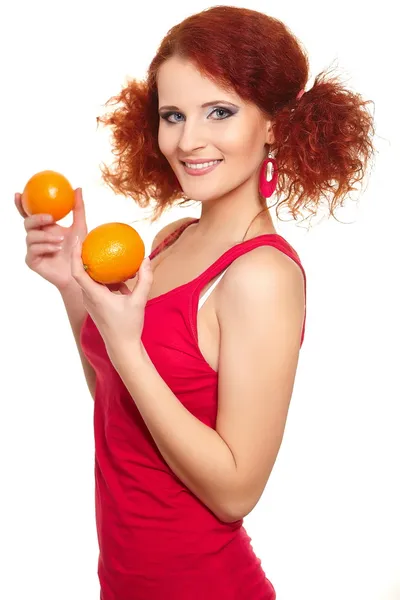 Portrait of beautiful smiling redhead ginger woman in red cloth isolated on white with orange — Stock Photo, Image
