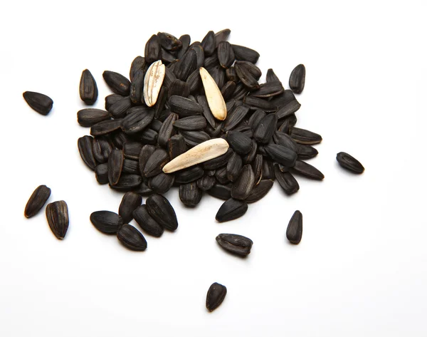 Black fried and salty sunflower seeds — Stock Photo, Image