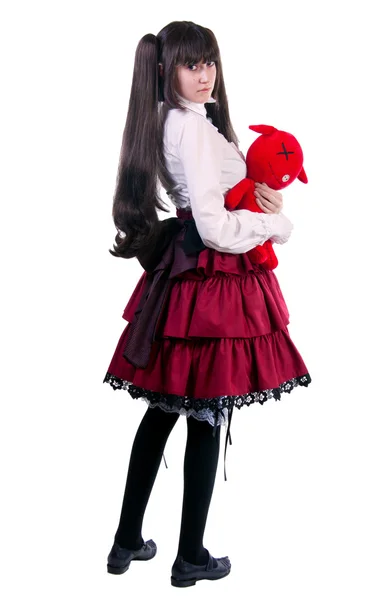 Mujer joven con un juguete rojo — Foto de Stock