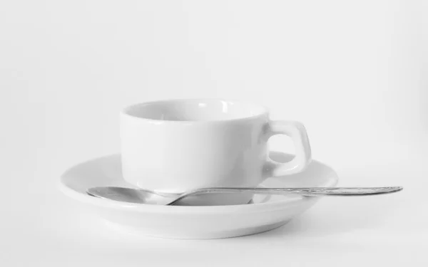 A white coffee cup and saucer — Stockfoto