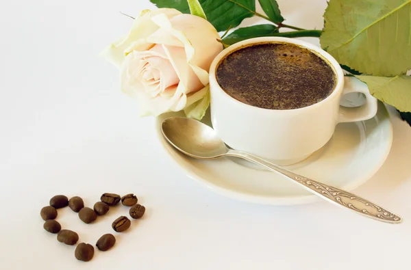 Чашка кофе и роза Лицензионные Стоковые Изображения