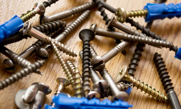 stock image Screws on the wooden floor