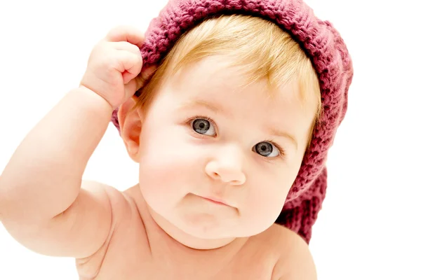 Close-up of a little girl in a lilac cap — Stock Photo, Image