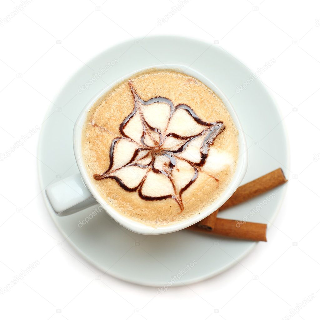 Cappuccino coffee with pattern of chocolate sauce isolated on wh