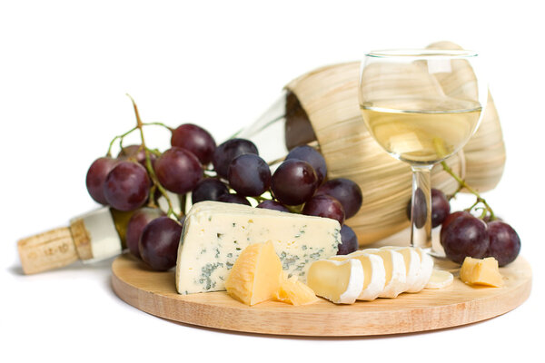 Gourmet food - wine, cheese and grapes isolated