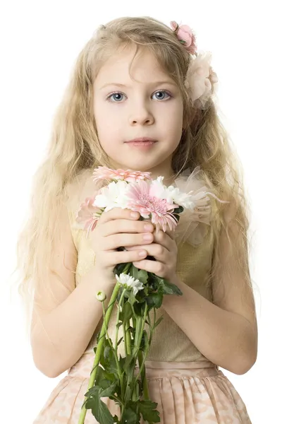 Όμορφο παιδί με ανοιξιάτικα λουλούδια που απομονώνονται σε λευκό — Φωτογραφία Αρχείου
